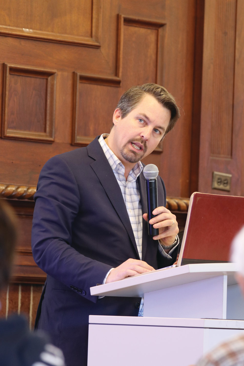 Dr. Chad Pecknold, associate professor of theology at Catholic University of America, offers his presentation during the first forum in the diocese’s Caring for Creation series, held on Oct. 19 at Providence College.